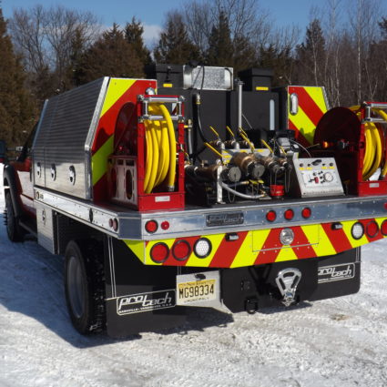 wildland firefighting brush truck in snow with skid unit