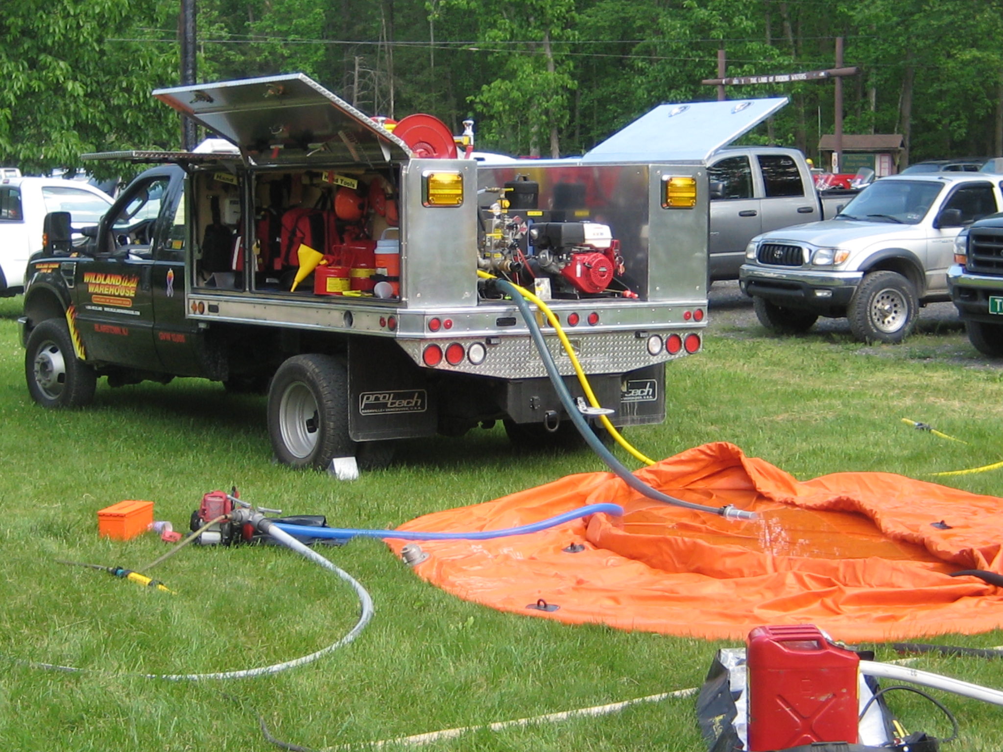 <p><strong>6</strong><br><em>My favorite pic. Our first demo type-6 on the job at the PA Forestry Fire Camp.<br>Note: Wick 80-4H in the grass.</em></p>