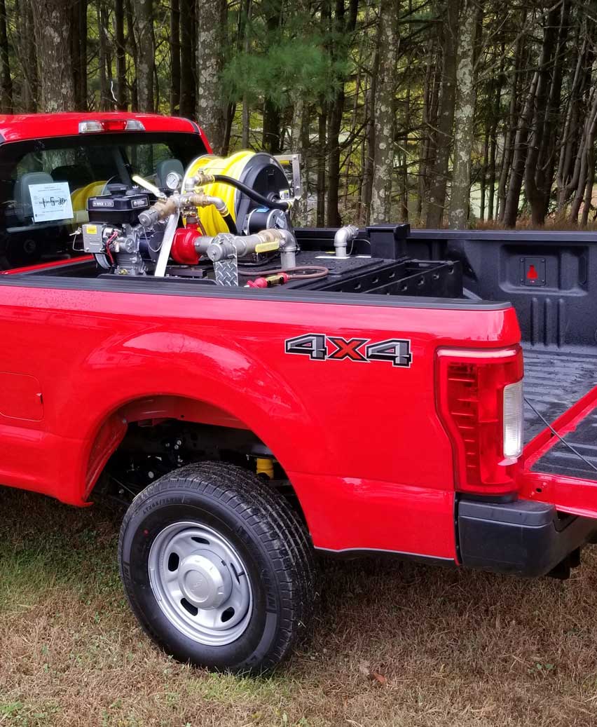<p><strong>7</strong><br><em>Type 7 skid unit mounted in a pickup truck.</em></p>