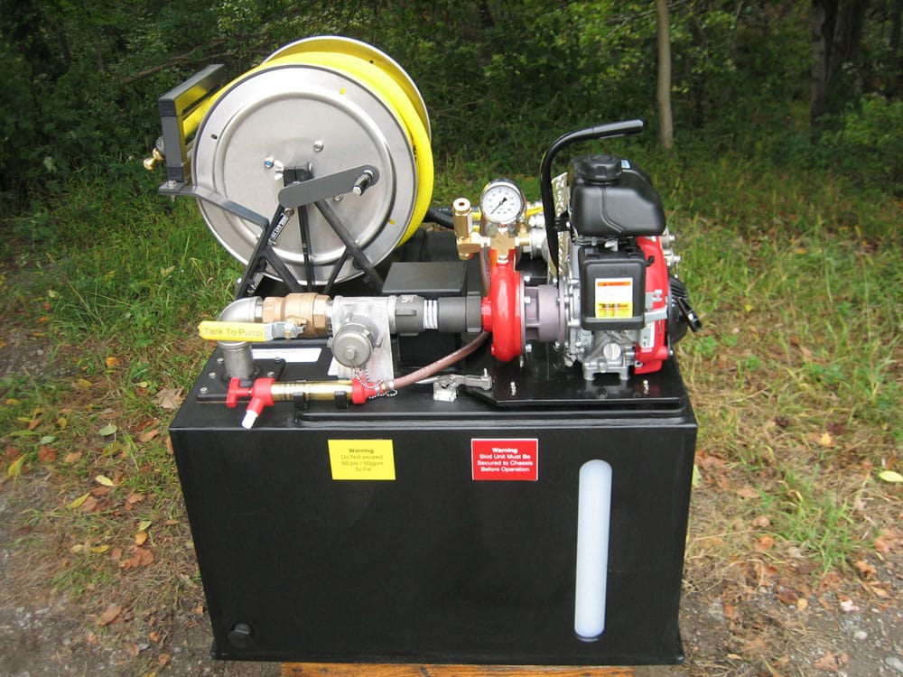 <p><strong>2</strong><br><em>The Simple 7 skid unit side view. Here you can see the reel, valves and tank capacity window.</em></p>